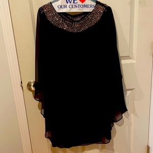 Beautiful cape dress w/detailed rose gold neckline